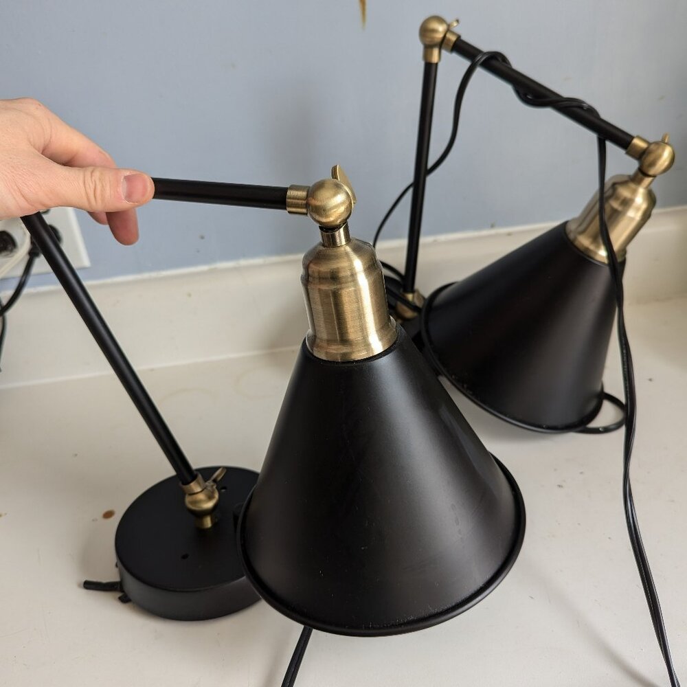 Pair of NEW black and brushed brass wall sconces